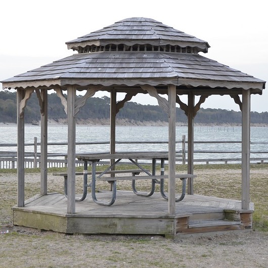 gazebo in front of lake