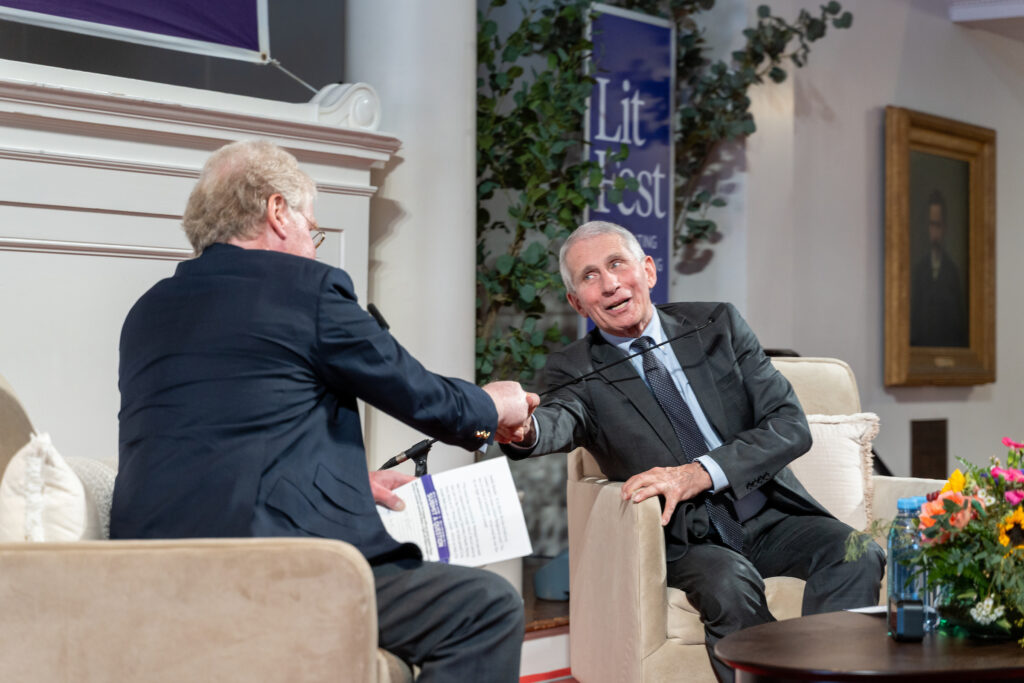 Fauci shaking Murphy's hand at the end of the Q&A.